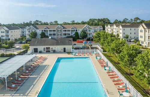 The Glade House | Resort Style Community Rehoboth Beach House Parking Pool
