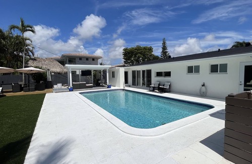 Deerfield Beach House | RESORT-STYLED 3 BDR HOME -HEATED POOL -UNDER A MILE FROM THE BEACH Huge Backyard
