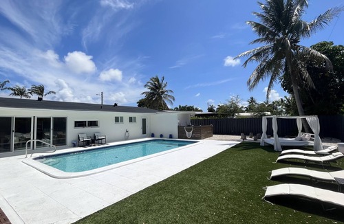 Deerfield Beach House | RESORT-STYLED 3 BDR HOME -HEATED POOL -UNDER A MILE FROM THE BEACH Huge Backyard