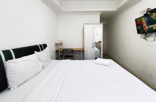 Jatingaleh Apartment | Restful and Tidy Studio at Paltrow City Apartment By Travelio