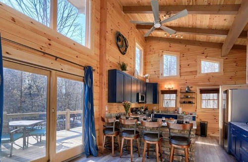 Logan House | Restful Getaways to Logan, Ohio, in this Fully-Equipped Log Cabin with Fireplace and Hot Tub