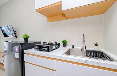 Kedungmanggu Apartment | Restful Studio With City View At Royal Sentul Park Apartment