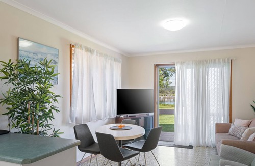 South Evans Head Apartment | Retro 1BR riverfront apartment with backyard, BBQ, and easy access to water activities