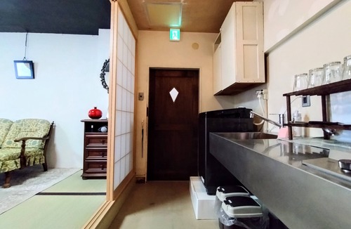 Yokosuka House | Retro Romantic Room! Private rooftop room with a view of Tokyo Bay beyond the Uraga Dock.