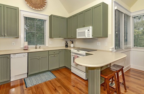 Keepers Landing House | Reverse floor plan cottage with screened in porch. Nature views!