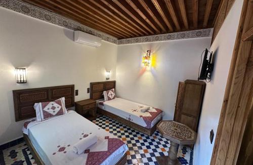 Ain Azlitan House | Riad Joseph
