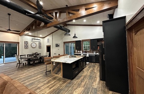 Mills River House | Rippling Waters! 3 BD 2.5 BA Riverfront Home, 8 min. from airport. Sleeps 11.