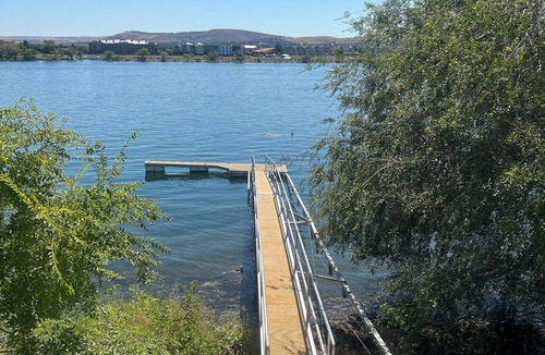 Pasco House | River Front Property with Boat Dock, basketball court BBQ and View
