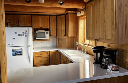 Clark House | River Frontage! Beautiful log home sitting on Yellowstone River with 360 views!