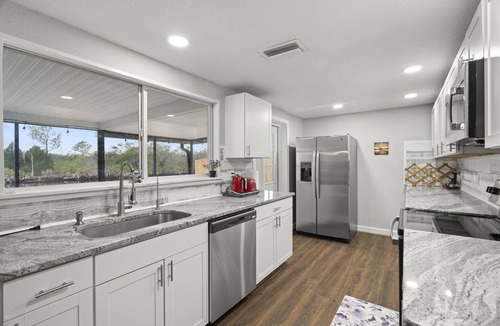 Forest Hills House | River House with heated Pool, Sunsets, Fishing, Dolphin & Manatee Watching