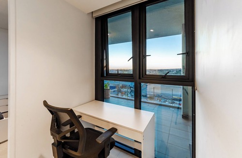 Eagle Farm Apartment | River Views & Stylish Stay at Portside Wharf