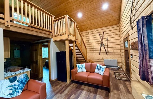 Houston Villa | Riverfront, Authentic, Luxury Log Cabin-Gray Wolf