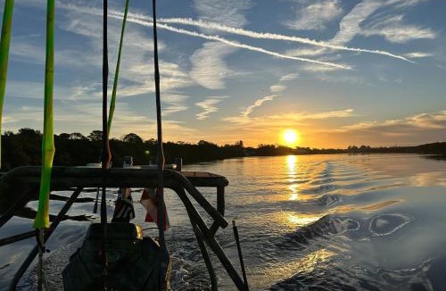 Ruskin House | Riverfront Basecamp to Boat | Fish | Chase Sunsets