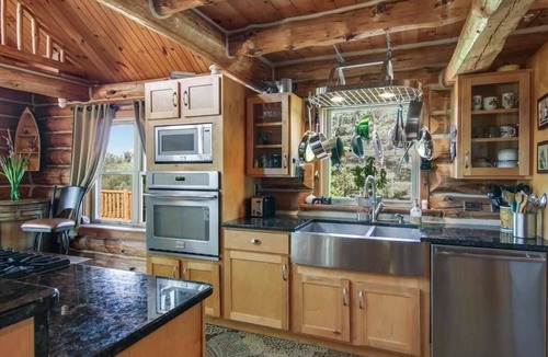 South Boardman House | Riverfront Beach Lodge Home in the Heart of Snowmobile Trails