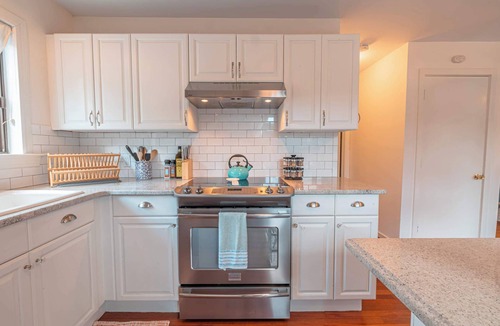 East Stroudsburg House | Riverfront Cabin | Fire Pit, Soaking Tub, Dogs OK