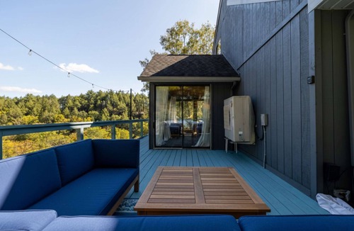 East Stroudsburg House | Riverfront Cabin | Fire Pit, Soaking Tub, Dogs OK