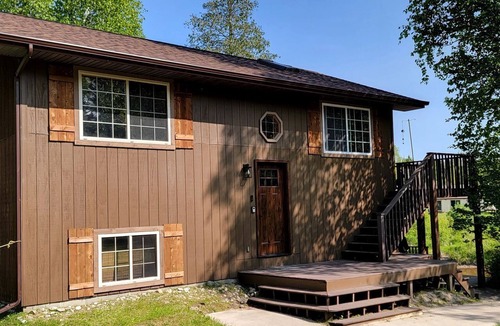 Hessel Cabin | Riverfront Cabin Incredible for Outdoor Enthusiasts with Kayaks in Hessel, Michigan