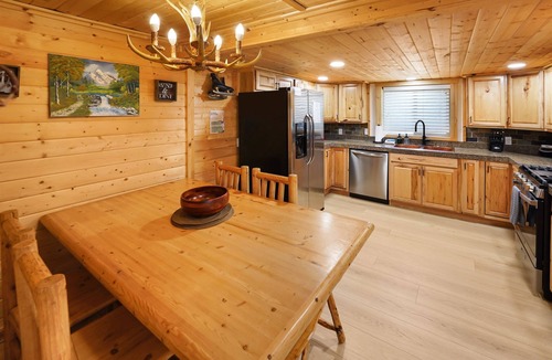 Sunriver Cabin | Riverfront Cabin w/Trails, Hot Tub, Wood Stove, AC & River Views + dogs OK