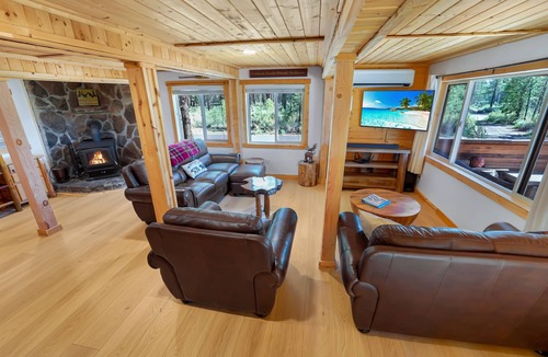 Sunriver Cabin | Riverfront Cabin w/Trails, Hot Tub, Wood Stove, AC & River Views + dogs OK