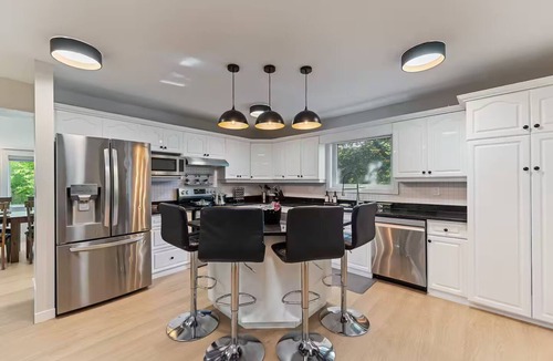 Winnipeg House | Riverfront City Escape w/Hot Tub, 2 King, Gym, Sleeps 12, Firepit, Kayaks