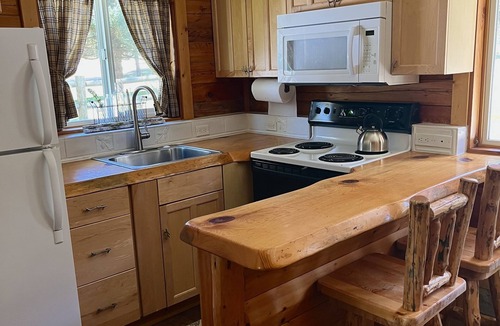 Garden Valley Cabin | Riverfront Cozy Cabin with spacious hot tub on the Middle Fork Payette River.