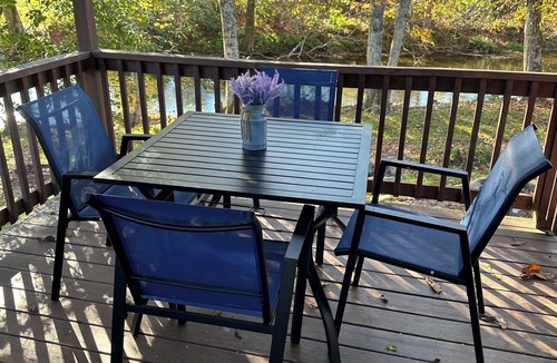 Altamont Cabin | Riverfront Escape: Fire Pit, private hot tub, river fun, sleeps 6