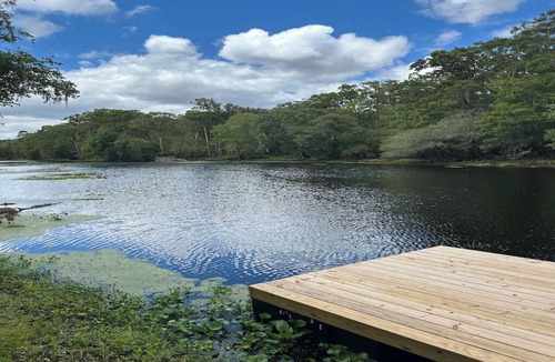 High Springs House | Riverfront Forest Retreat - Near Springs & UF! 3BR/2BA on the Santa Fe River!
