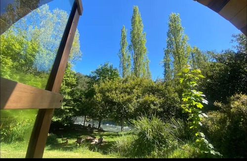 Jamieson House | Riverfront front cabin with sauna and hot tub overlooking the river.
