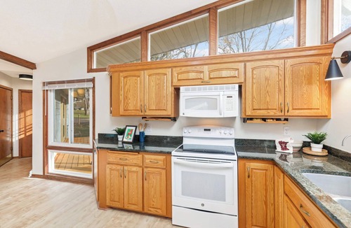 St. Cloud House | Riverfront Home 1 HR to MSP. Sleeps 9. Main Floor Living. Firepit & Pool Table