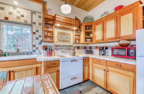 Mount Hood Village House | Riverfront home close to skiing & fishing with beach access & huge VHS library