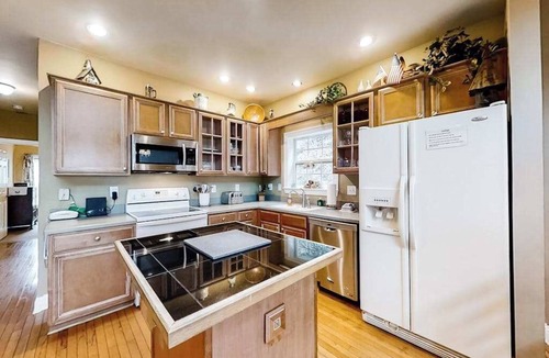 Sylva House | Riverfront home w/fireplace, porch, outdoor firepit, grill and picnic table