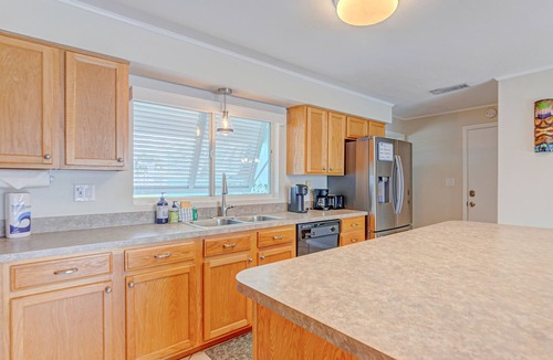 Venetian Way House | Riverfront home with private heated pool, dock, AC & W/D - dog-friendly