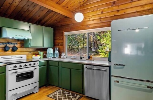 Rhododendron Cabin | Riverfront Log Cabin with Sauna, Hot Tub, Whisky Barn