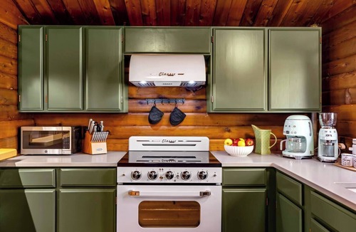 Rhododendron Cabin | Riverfront Log Cabin with Sauna, Hot Tub, Whisky Barn