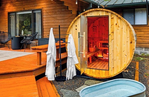 Rhododendron Cabin | Riverfront Log Cabin with Sauna, Hot Tub, Whisky Barn