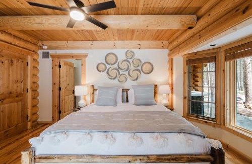 Three Rivers House | Riverfront log cabin style home with full kitchen deck washer & dryer and WIFI