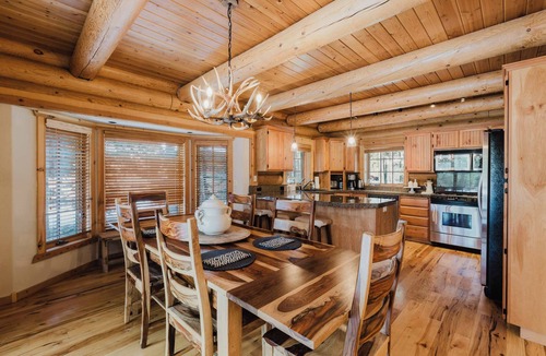 Three Rivers House | Riverfront log cabin style home with full kitchen, deck, washer & dryer and WIFI