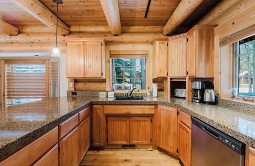 Three Rivers House | Riverfront log cabin style home with full kitchen, deck, washer & dryer and WIFI