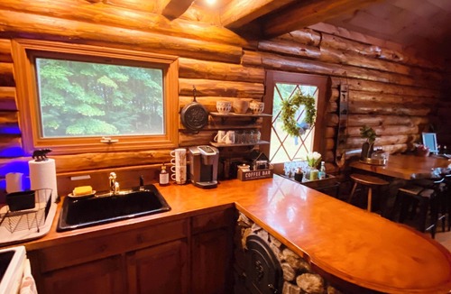 Wentworth Cabin | Riverfront Log Cabin with Mountain Views - Hot Tub & Wood Burning Fireplace