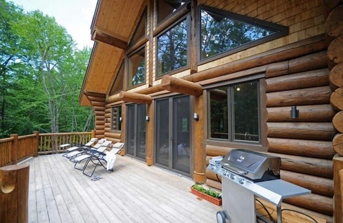 Mont-Tremblant House | Riverfront loghome. 3-minutes to ski resort. Theatre room as bonus 5th bedroom.
