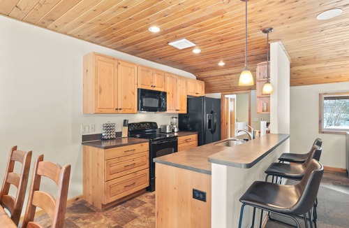 Naches Cabin | Riverfront luxury on White Pass with hot tub, firepit, and game room