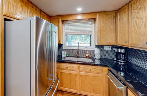 East Ellijay House | Riverfront townhome with two decks, fireplace, gazebo & woodland views