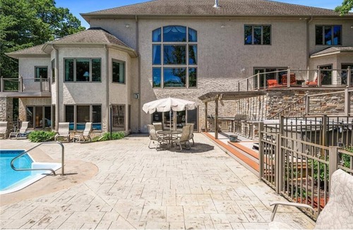 Oak Grove House | Riverfront vacation home with 2 full kitchens, a fitness center and sauna