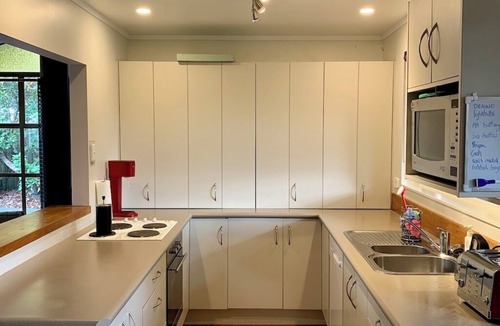Broadlands Forest House | Riverside accommodation which is perfect for groups. Pizza oven, covered deck.