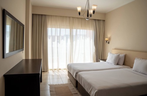 Village Road Hotel | Rivoli Suites