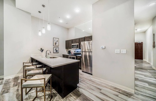 Gateway District Apartment | Rock & Roll Flat w/Indoor Pool+Sauna+Gym Downtown