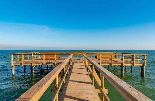 Sailhouse Condo | Rockport Racquet and Yacht Club condo with lovely tree covered grounds, pool, and fishing!