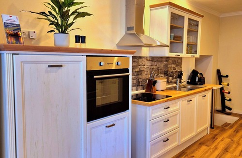 Dhron Apartment | Romantic accommodation on the Moselle. Sleep in the historic wine cellar.