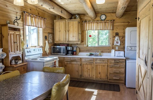 Whitehall Cabin | Romantic Cabin Rental with a Delightful Porch near Ennis, Montana