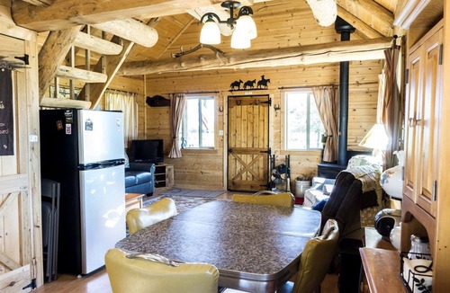 Whitehall Cabin | Romantic Cabin Rental with a Delightful Porch near Ennis, Montana